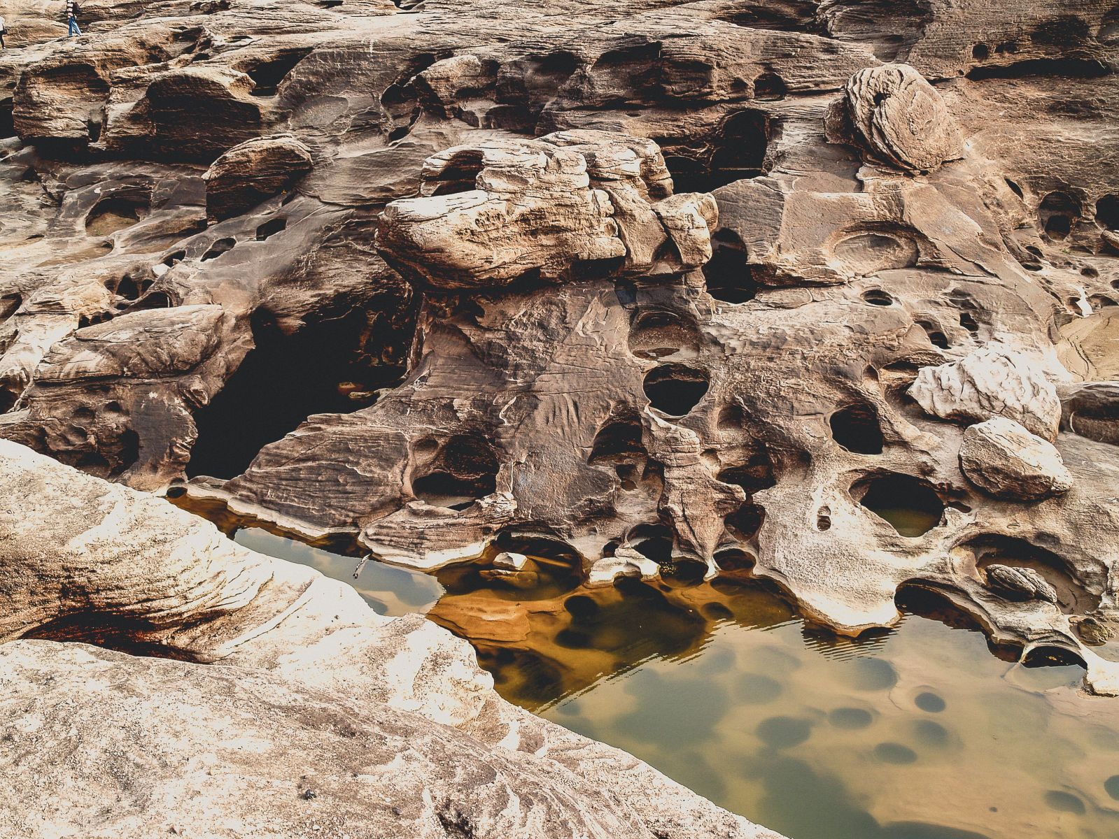 Discover unique rock formations and bodies of water that showcase the artistry of nature.
