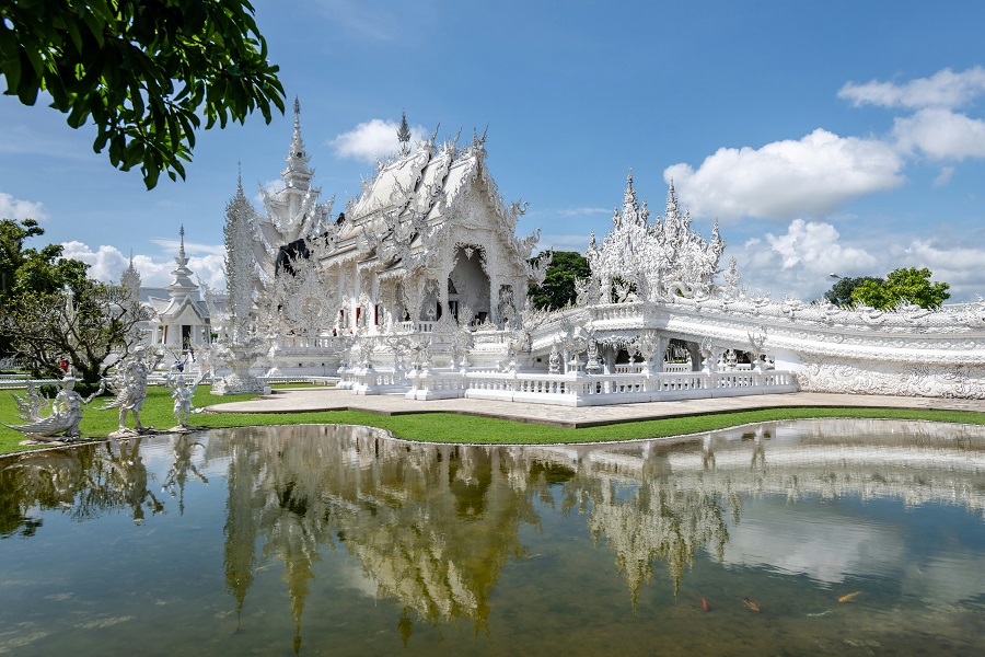The White Temple in Chiang Rai dazzles visitors with its white facade 