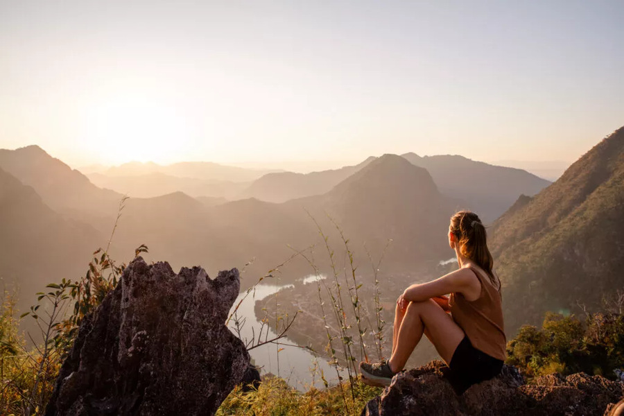 watching sunset at Pha Deang Peak, Nong Khiaw, Laos