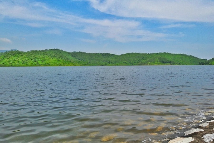 Take a boat in Suoi Lanh Lake to navigate the calm water 