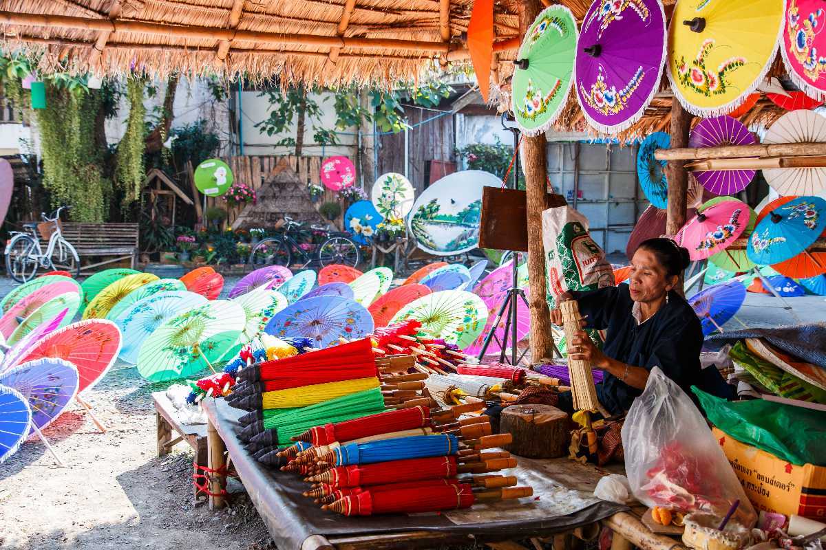A stall of an artisan with colorful and varied-shape umbrellas in San Kamphaeng