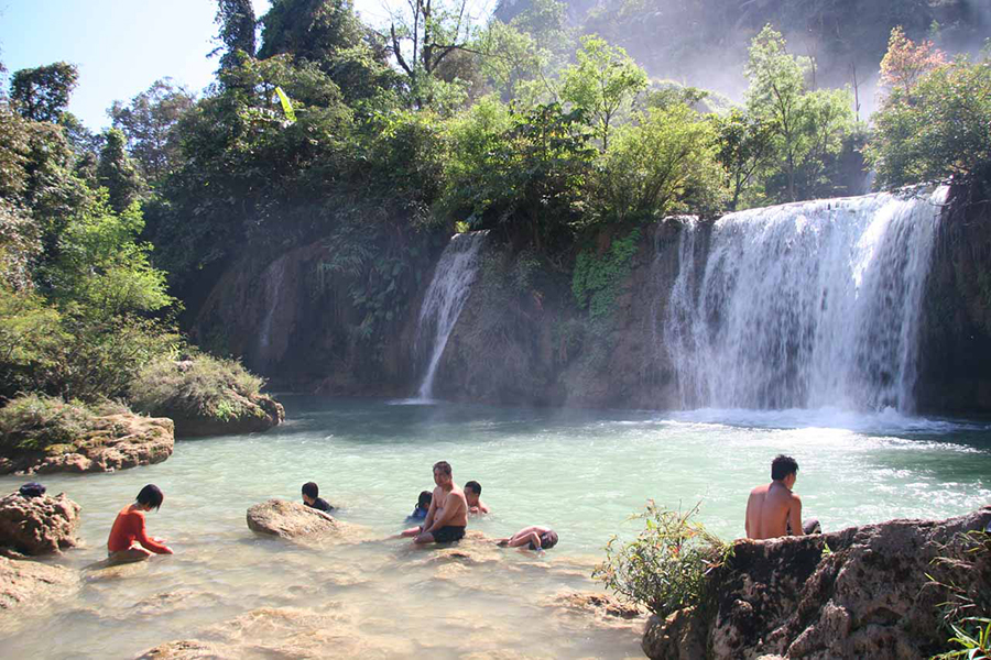 Swimming in Thi Lo Su Waterfall