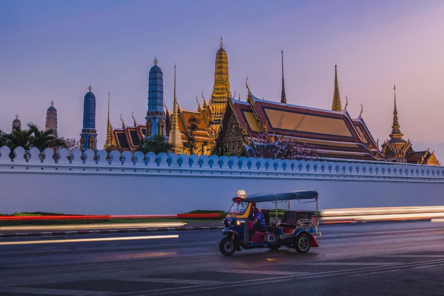 take a tuk-tuk ride for sightseeing in Thailand