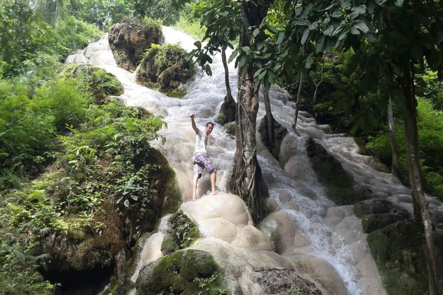 The Sticky Waterfall (Bua Tong) in Chiang Mai offers a unique climbing experience unlike any other – a must-try on any healing travel Thailand journey.