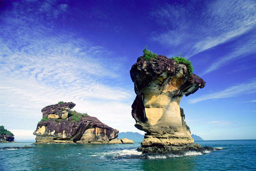 Unique sea stacks rising from turquoise waters