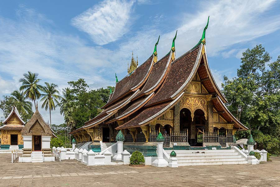 Wat Xieng Thong houses the funeral carriage of the former king, adding a historical dimension to your visit
