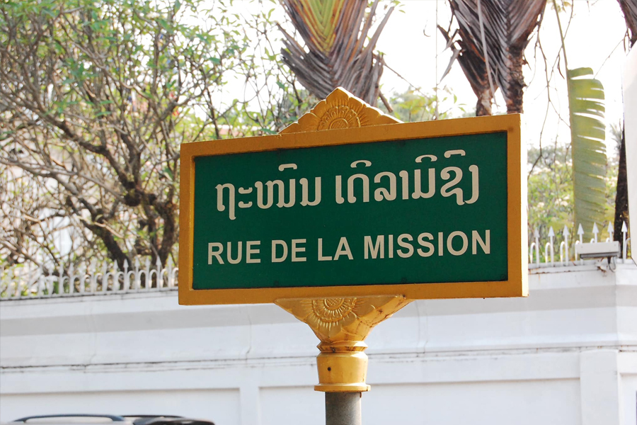 A sign with the French language in Laos
