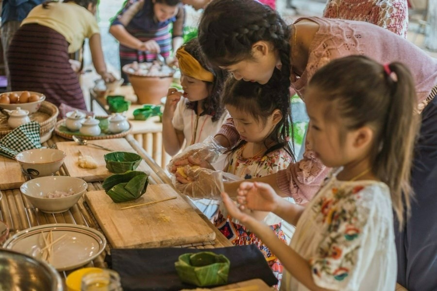 Cooking class for children to learn some traditional dishes in Laos