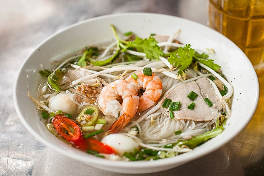 A noodle soup commonly eaten for breakfast, Kuy Teav features rice noodles in a flavorful broth with pork, beef, or seafood
